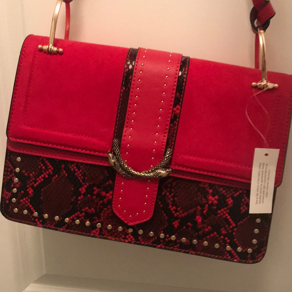 Red snake skin purse
